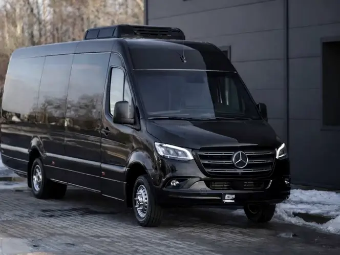Black Mercedes Sprinter with tinted windows
