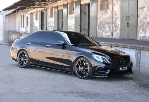 Black Mercedes S-Class luxury limousine